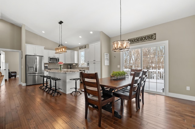 dining room featuring visible vents, dark wood-style floors, recessed lighting, baseboards, and a chandelier