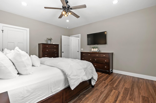 bedroom with recessed lighting, baseboards, dark wood-type flooring, and a ceiling fan