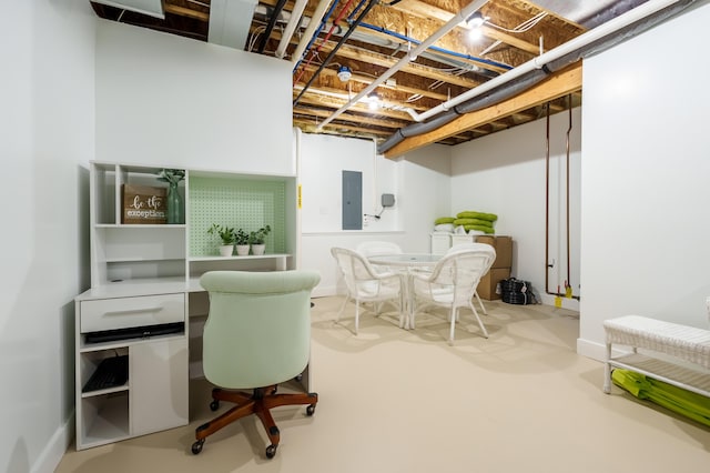 interior space with electric panel and finished concrete floors