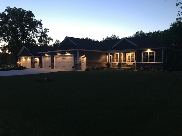 view of front of home featuring an attached garage and driveway