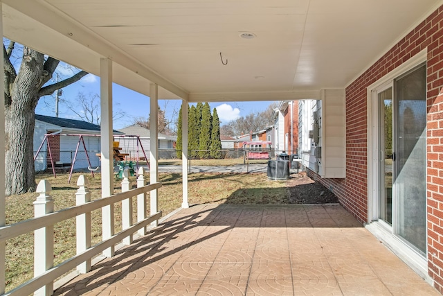 view of patio with fence