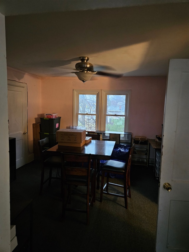 dining room with a ceiling fan