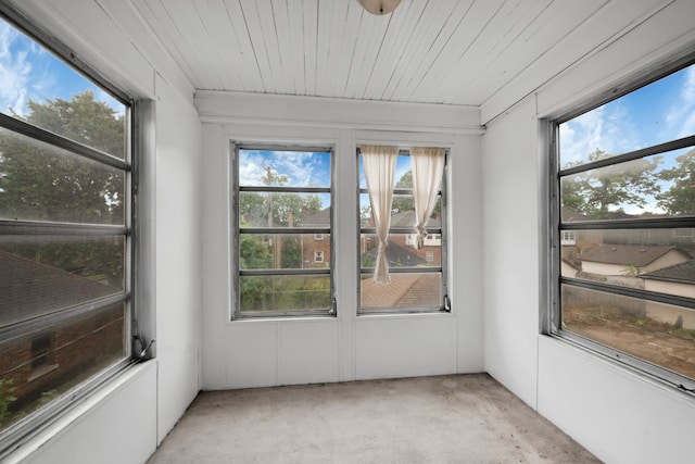 unfurnished sunroom with a healthy amount of sunlight