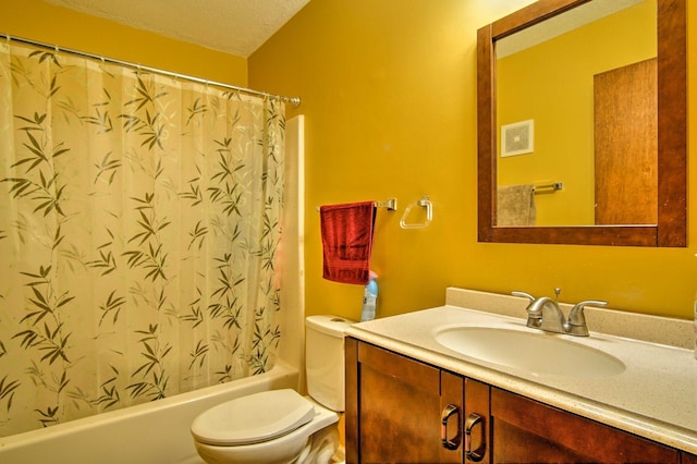 bathroom with shower / tub combo with curtain, a textured ceiling, toilet, and vanity