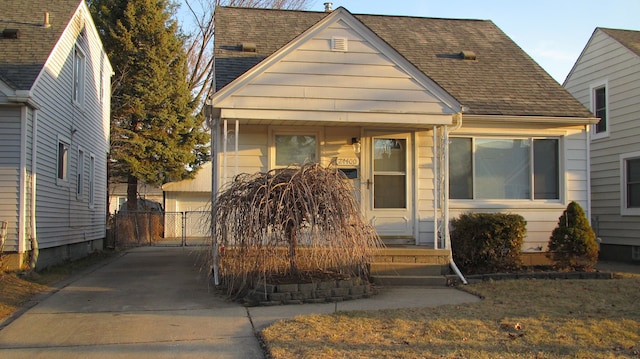 view of front of home with a shingled roof