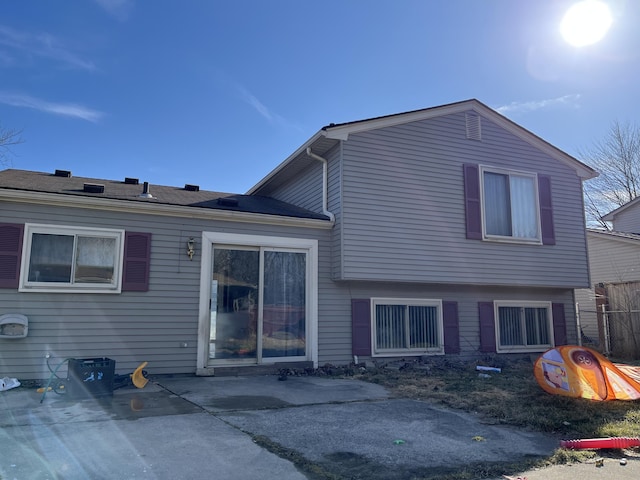 back of property with a patio area