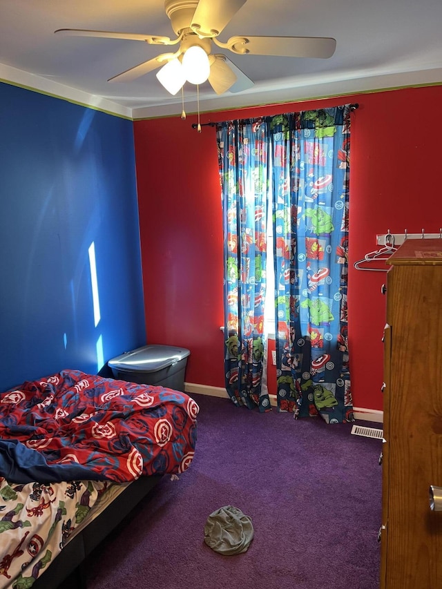 bedroom featuring carpet flooring, baseboards, and ceiling fan