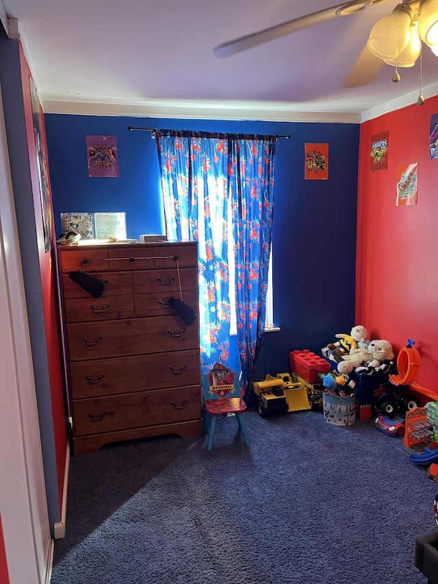 bedroom with carpet floors and a ceiling fan