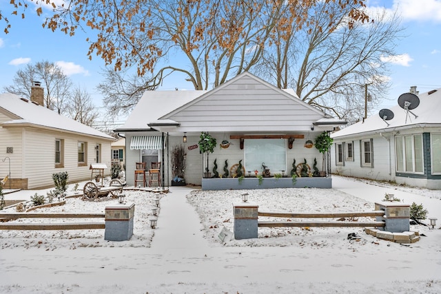 view of snow covered property