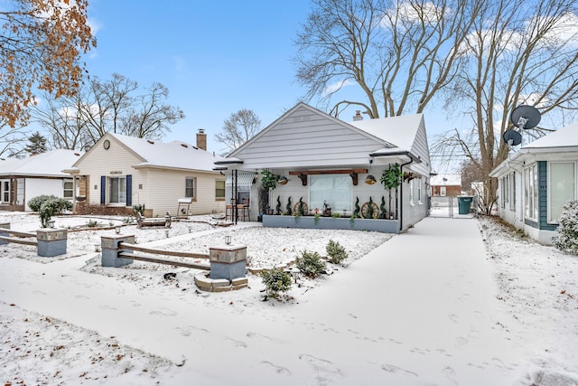 view of snow covered house