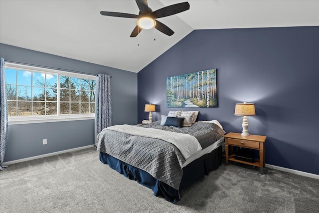 carpeted bedroom featuring a ceiling fan, baseboards, and vaulted ceiling