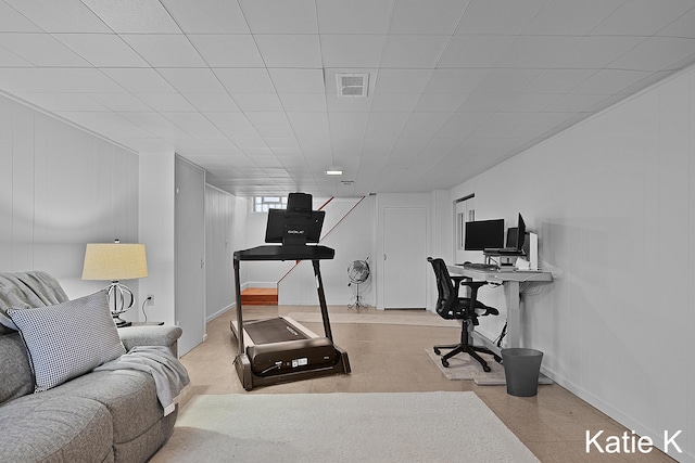 exercise area featuring visible vents and baseboards