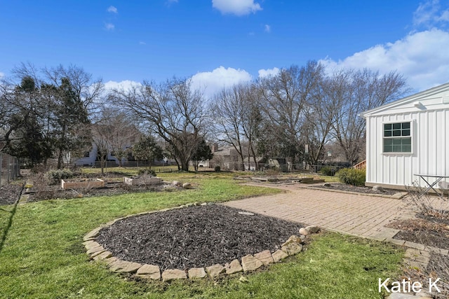 view of yard with a patio and fence