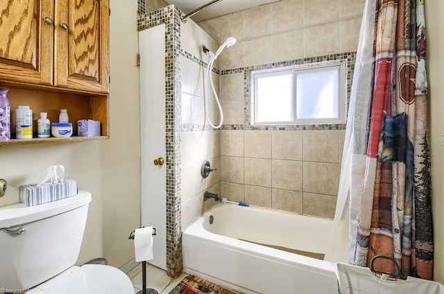 full bathroom featuring toilet and shower / bath combo