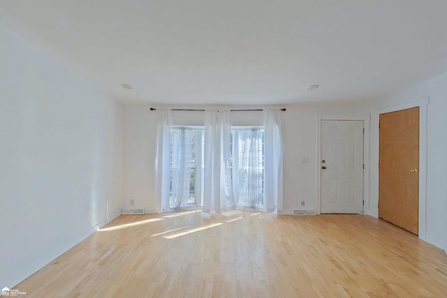 empty room featuring light wood finished floors