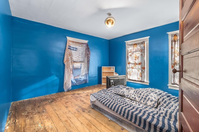 bedroom featuring hardwood / wood-style flooring