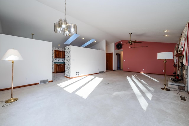 unfurnished living room featuring visible vents, light colored carpet, ceiling fan, and high vaulted ceiling