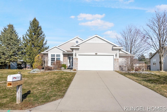 view of front of home with a front lawn, stone siding, a garage, and driveway