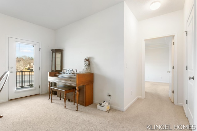 carpeted office featuring baseboards