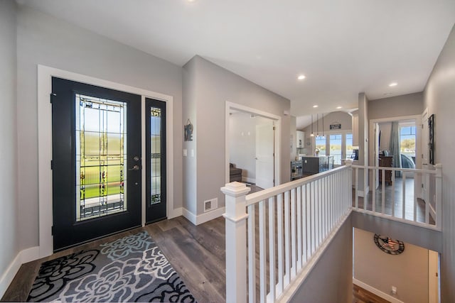 entrance foyer with recessed lighting, visible vents, baseboards, and dark wood-style floors