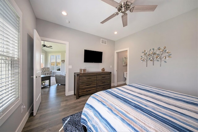 bedroom featuring recessed lighting, visible vents, baseboards, and dark wood-style floors