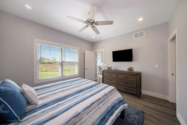 bedroom featuring wood finished floors, recessed lighting, baseboards, and visible vents