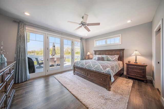 bedroom with recessed lighting, french doors, dark wood-type flooring, and access to outside