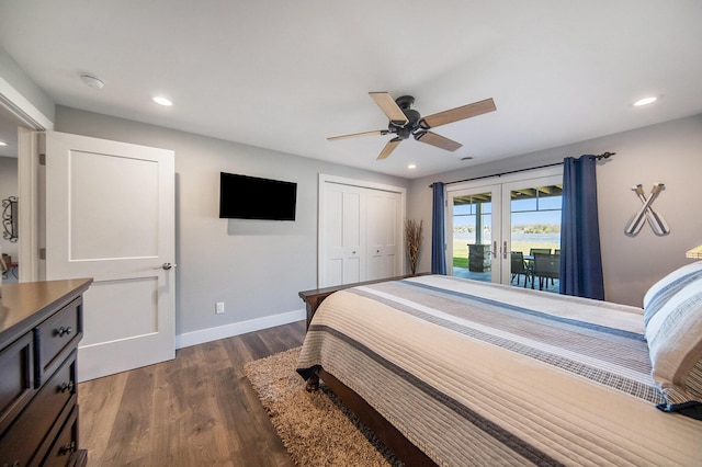 bedroom featuring recessed lighting, french doors, dark wood-type flooring, and baseboards