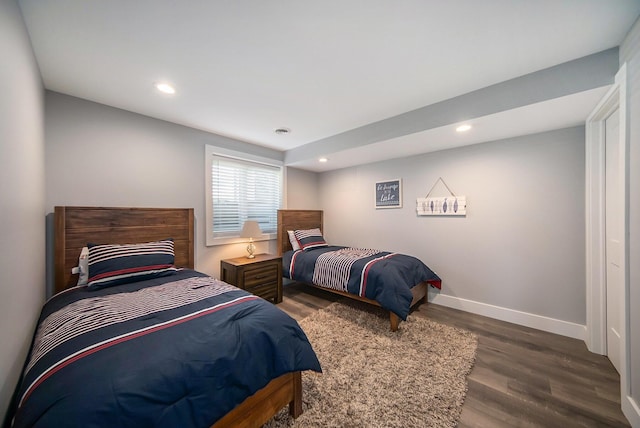 bedroom featuring recessed lighting, baseboards, and wood finished floors