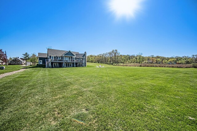 view of yard with a deck