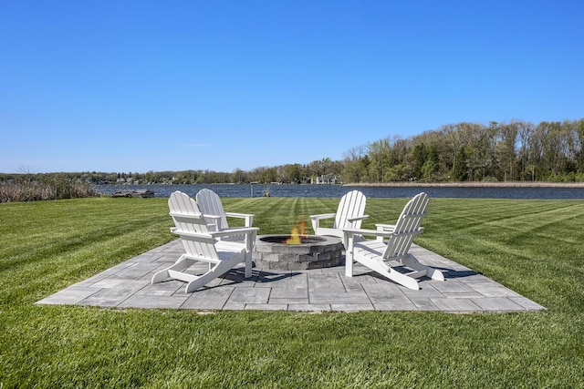 view of patio / terrace with a fire pit