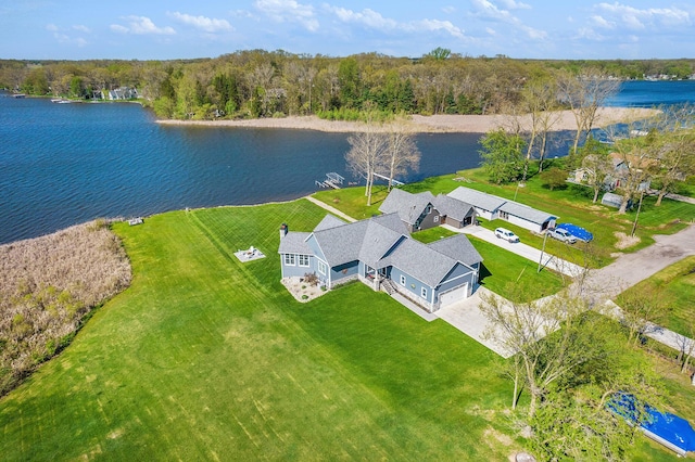 drone / aerial view with a water view