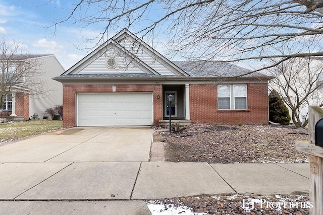 ranch-style house featuring a garage, brick siding, and concrete driveway