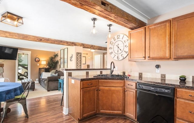 kitchen featuring open floor plan, beamed ceiling, black dishwasher, a peninsula, and a sink