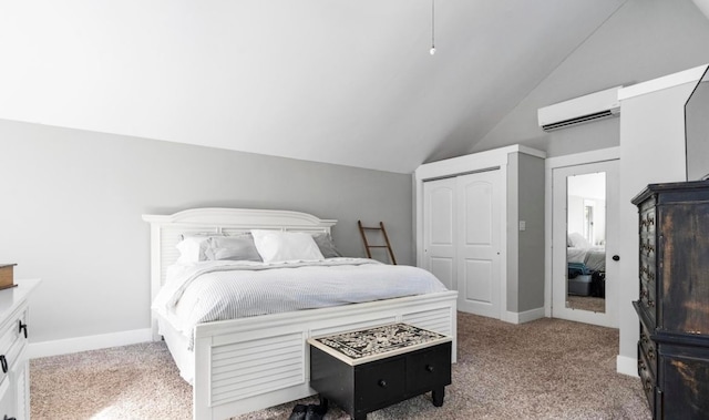 carpeted bedroom featuring a closet, a wall mounted air conditioner, baseboards, and vaulted ceiling