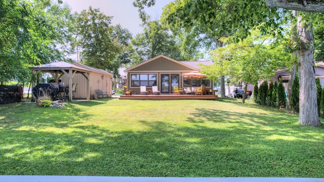 view of yard featuring a gazebo and a wooden deck