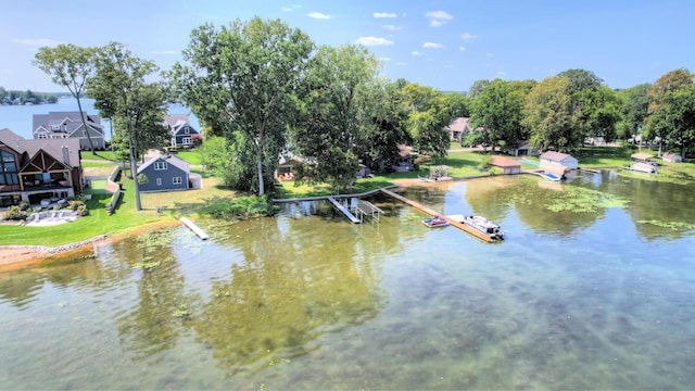 water view featuring a residential view and a dock