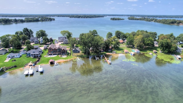 bird's eye view with a residential view and a water view