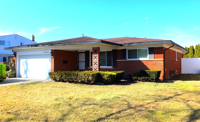 single story home with a garage, driveway, brick siding, and a front yard