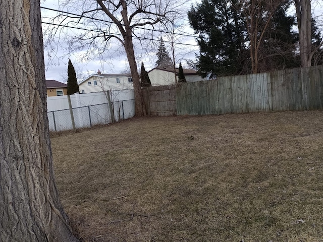 view of yard with fence