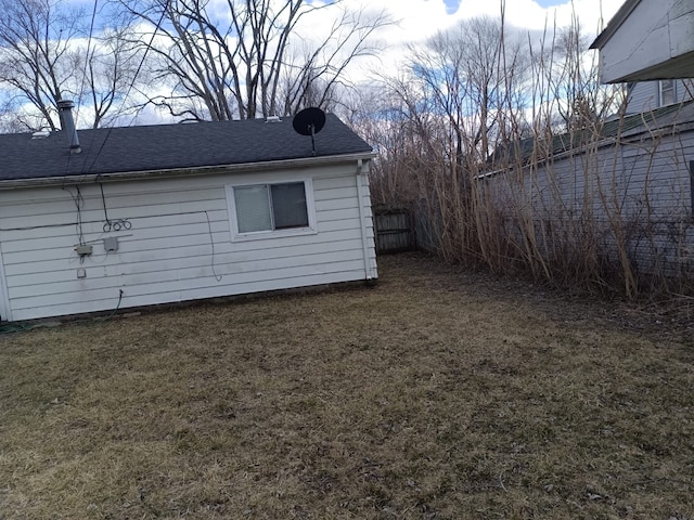 view of outdoor structure with fence