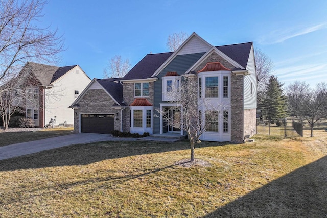 traditional-style home featuring brick siding, a front lawn, fence, a garage, and driveway