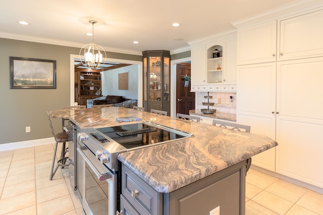 kitchen with light tile patterned floors, a kitchen island, electric range, white cabinets, and crown molding