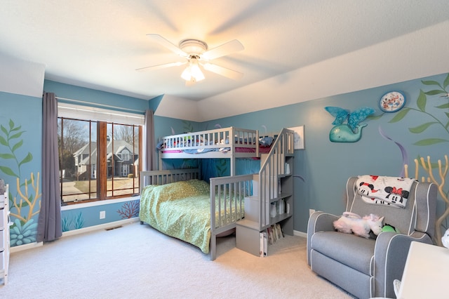 bedroom featuring a ceiling fan, visible vents, carpet, and baseboards