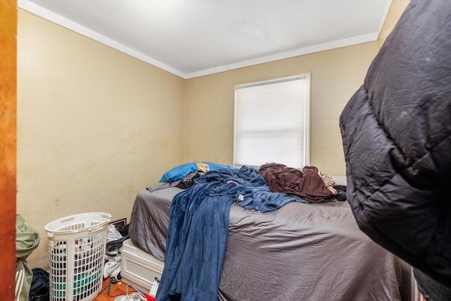 bedroom featuring ornamental molding