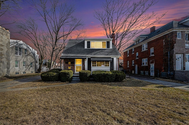 view of front of house with a yard