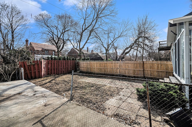 view of yard featuring fence private yard