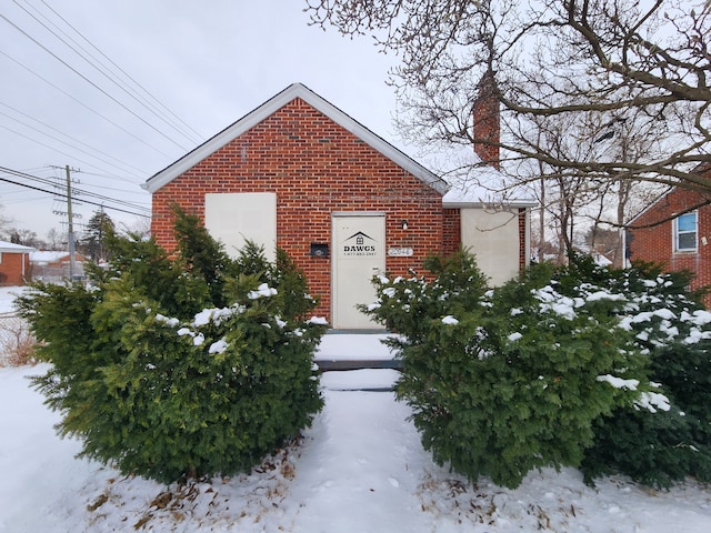 20048 Fleming St, Detroit, MI 48234 - view of front of property featuring a chimney and brick siding
