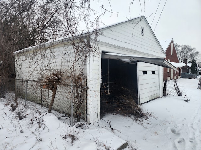 20048 Fleming St, Detroit, MI 48234 - snow covered garage with a garage
