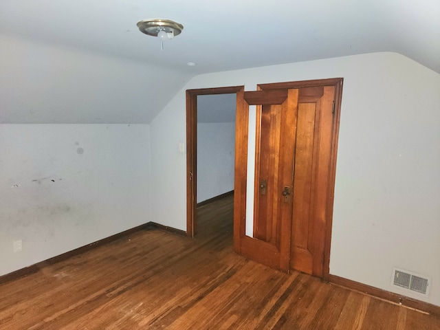 20048 Fleming St, Detroit, MI 48234 - bonus room with baseboards, visible vents, wood finished floors, and lofted ceiling